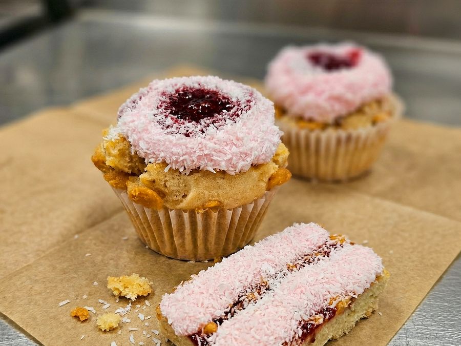Raspberry jam and pink coconut muffin with a matching slice