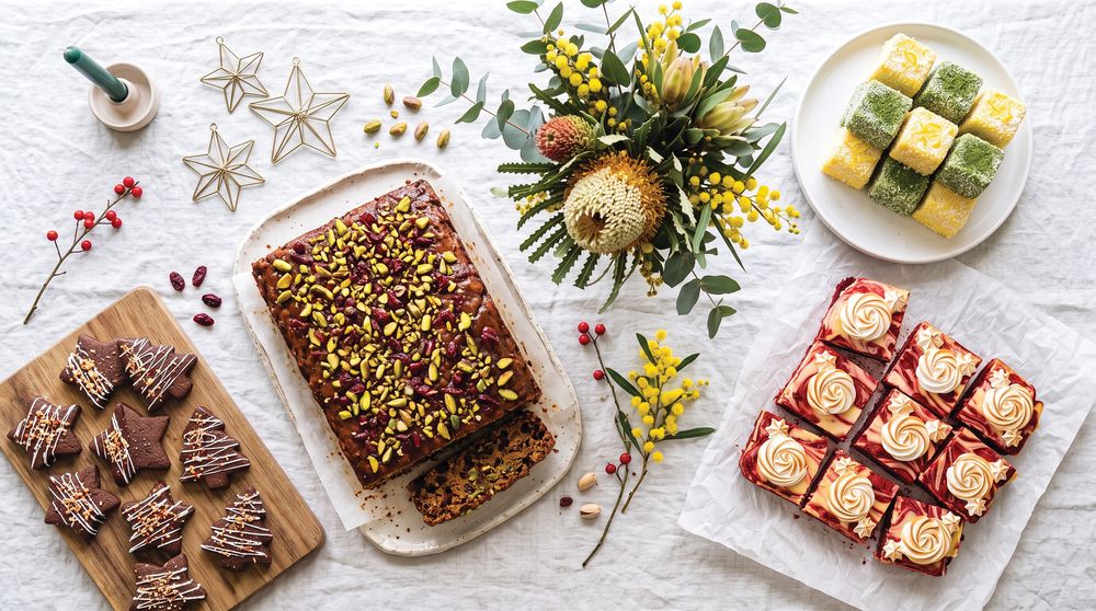 Pistachio fruit cake, red velvet cheesecake slab, lamingtons and chocolate shortbread stars